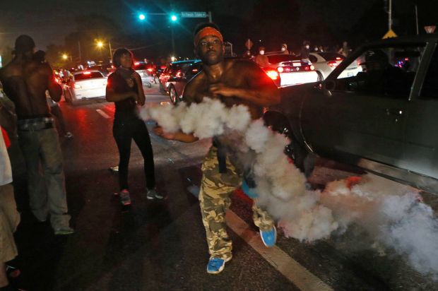 Police tear gas protesters again